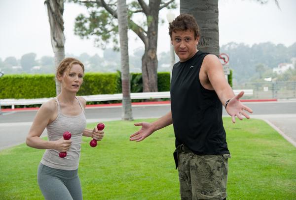 SCENE IN THE BEGINNING OF MOVIE - ACTOR JASON SEGEL GIVING ACTRESS LESLIE MANN A FITNESS LESSON.