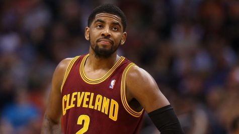 PHOENIX, AZ - MARCH 12:  Kyrie Irving #2 of the Cleveland Cavaliers watches a free throw attempt during the first half of the NBA game against the Phoenix Suns at US Airways Center on March 12, 2014 in Phoenix, Arizona.  NOTE TO USER: User expressly acknowledges and agrees that, by downloading and or using this photograph, User is consenting to the terms and conditions of the Getty Images License Agreement.  (Photo by Christian Petersen/Getty Images)